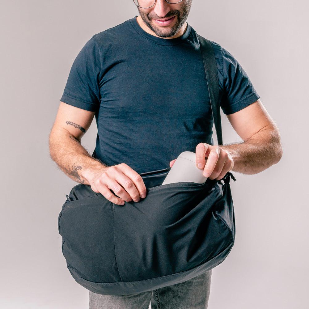 ReFraction™ Packable Duffle (Black) - 25L - Image 11