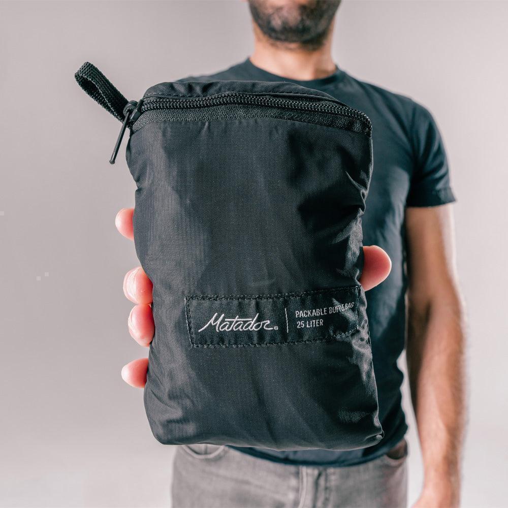 ReFraction™ Packable Duffle (Black) - 25L - Image 7